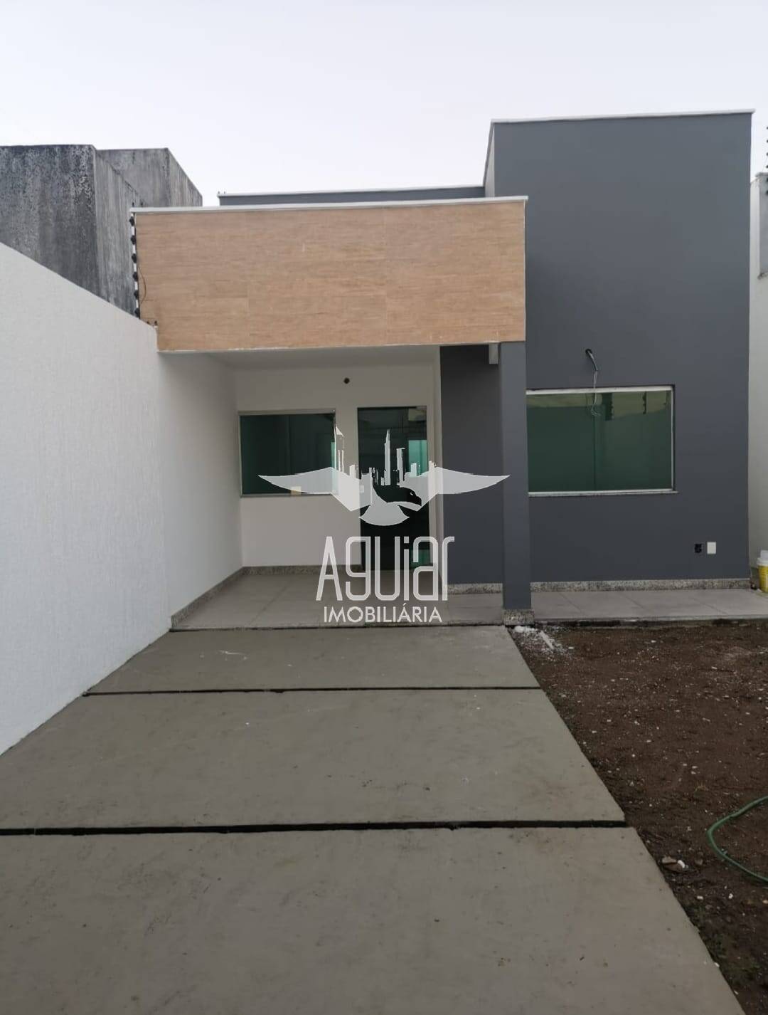 Casa à venda com 3 quartos, 90m² - Foto 2